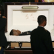 Mourners pay their respect during a funeral service for Army 2nd Lt. Richard Collins III, on May 26, 2017, in Upper Marlboro, Md.